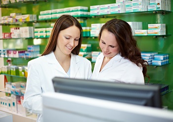 Pharmacist training a Pharmacy Technician
